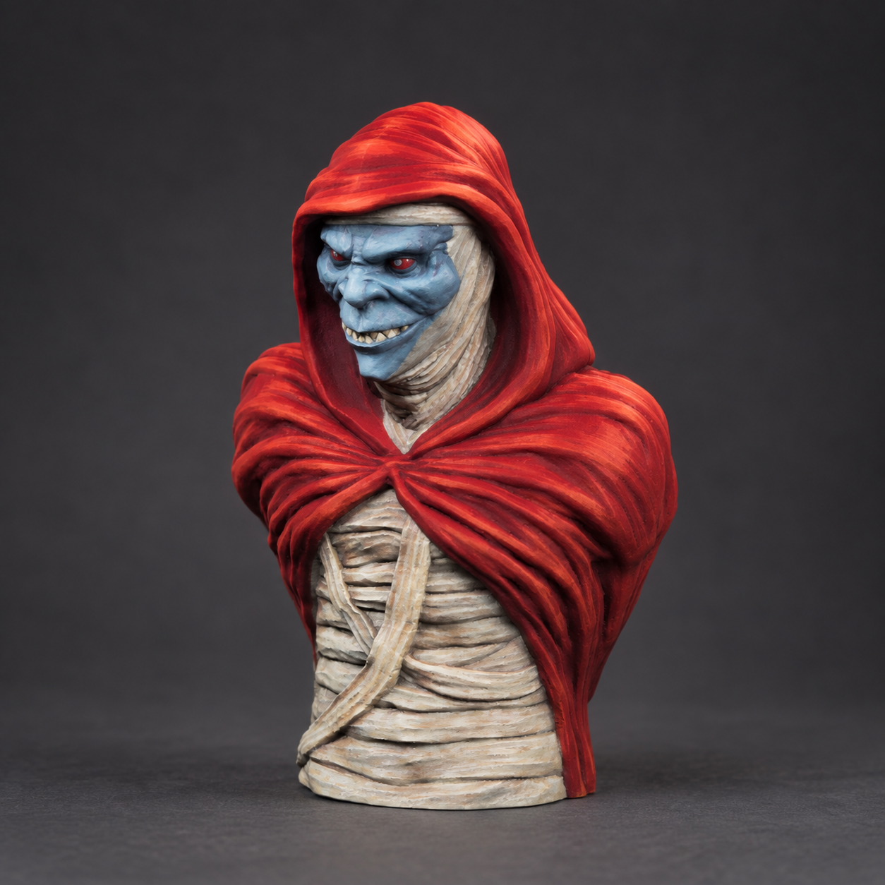 Scarlet cloak and ivory bandages