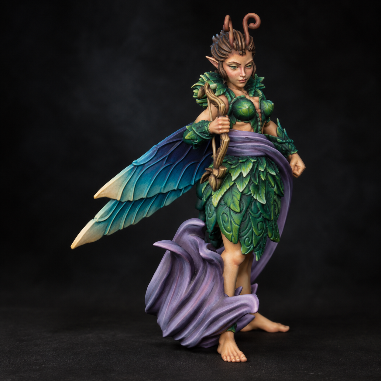 Sprite — jade leaves and blue wings